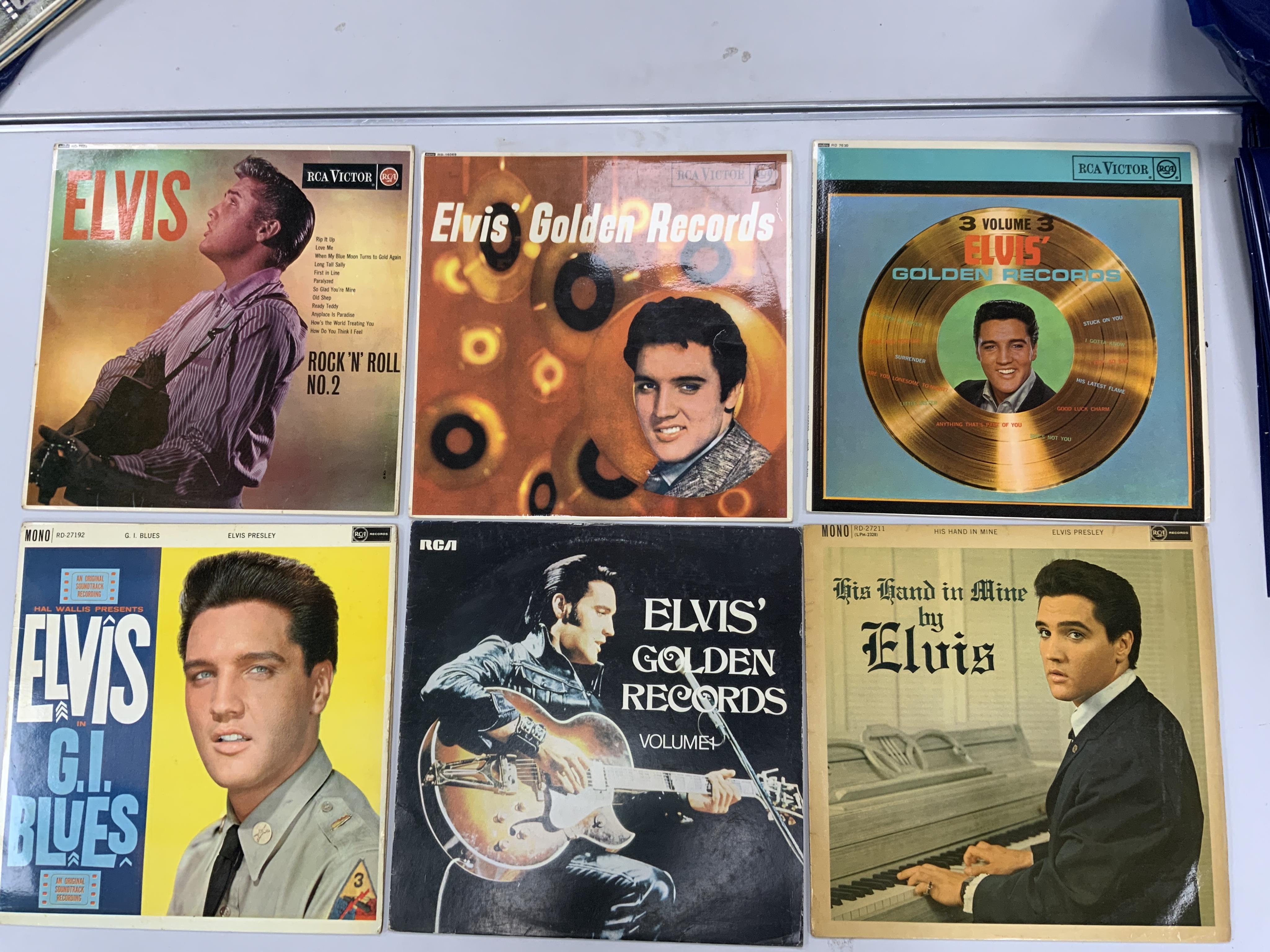 Sixteen Elvis Presley LP record albums including; It Happened at the World’s Fair, Paradise Hawaiian Style, Elvis’ Golden Records, Blue Hawaii, Loving You, California Holiday, Kissin’ Cousins, etc. Condition - fair to go